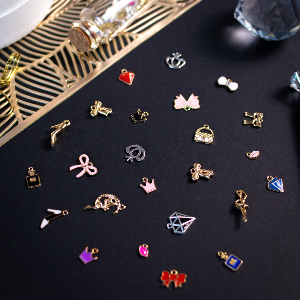 Celebrate your power, grace, and essence with charms that radiate feminine strength and beauty.