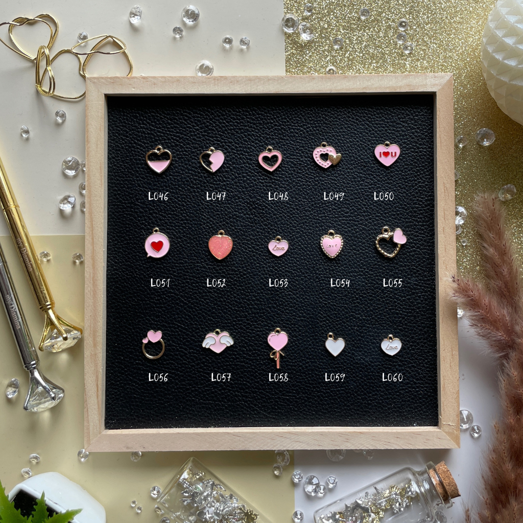 Celebrate love stories, deep connections, and self-love with charms that speak from the heart.