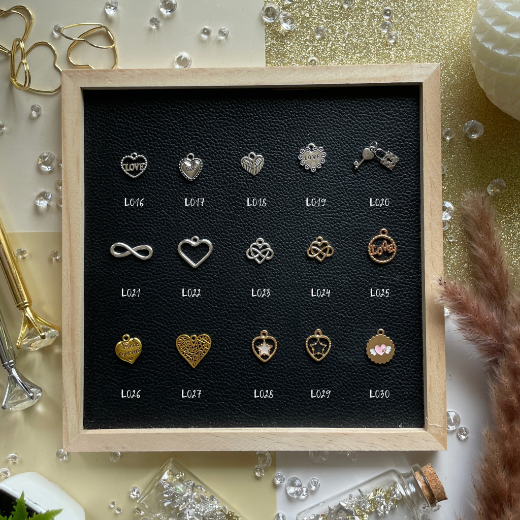 Celebrate love stories, deep connections, and self-love with charms that speak from the heart.